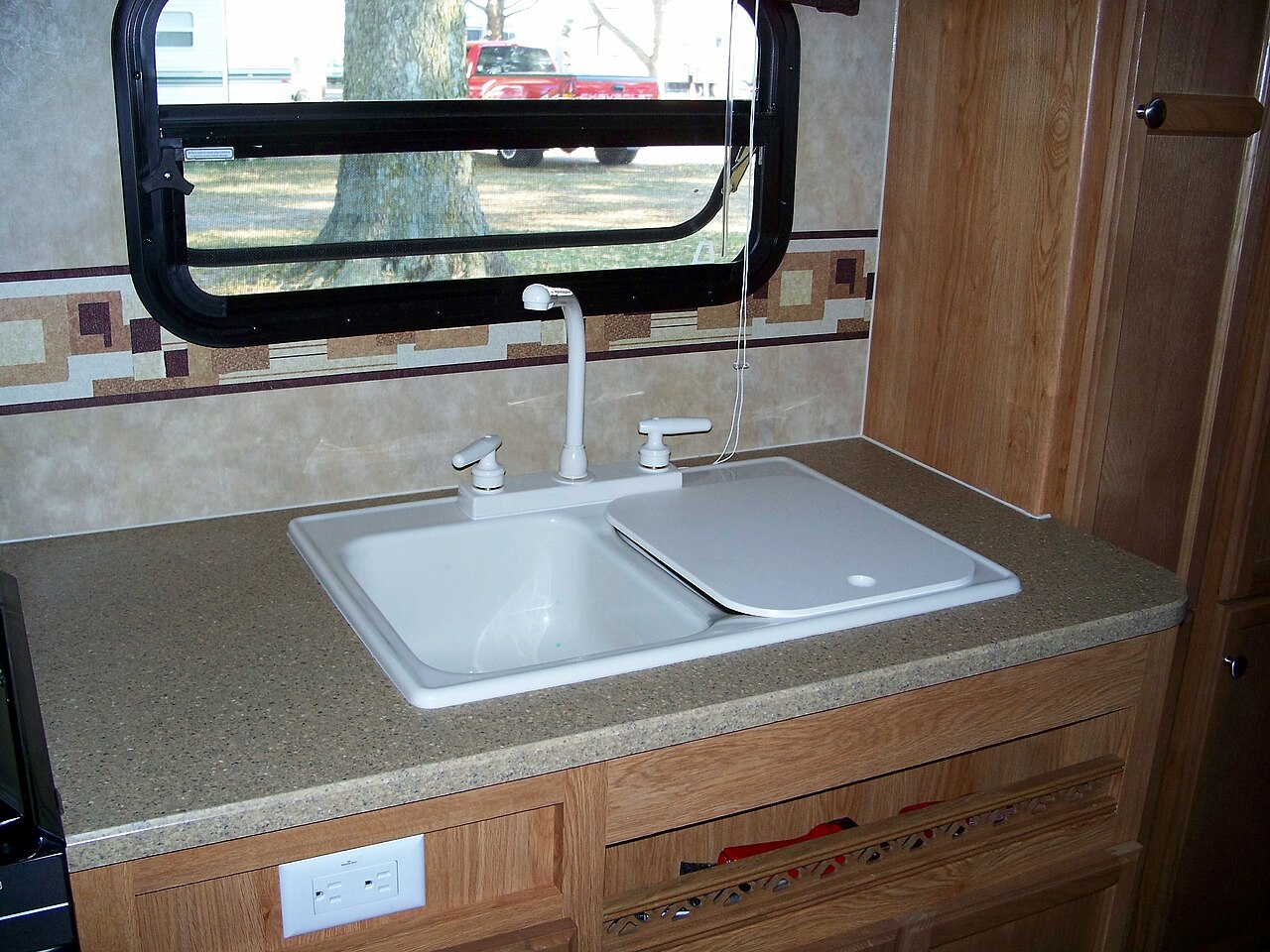A Jayco RV kitchen, illustrating interior layout and storage.