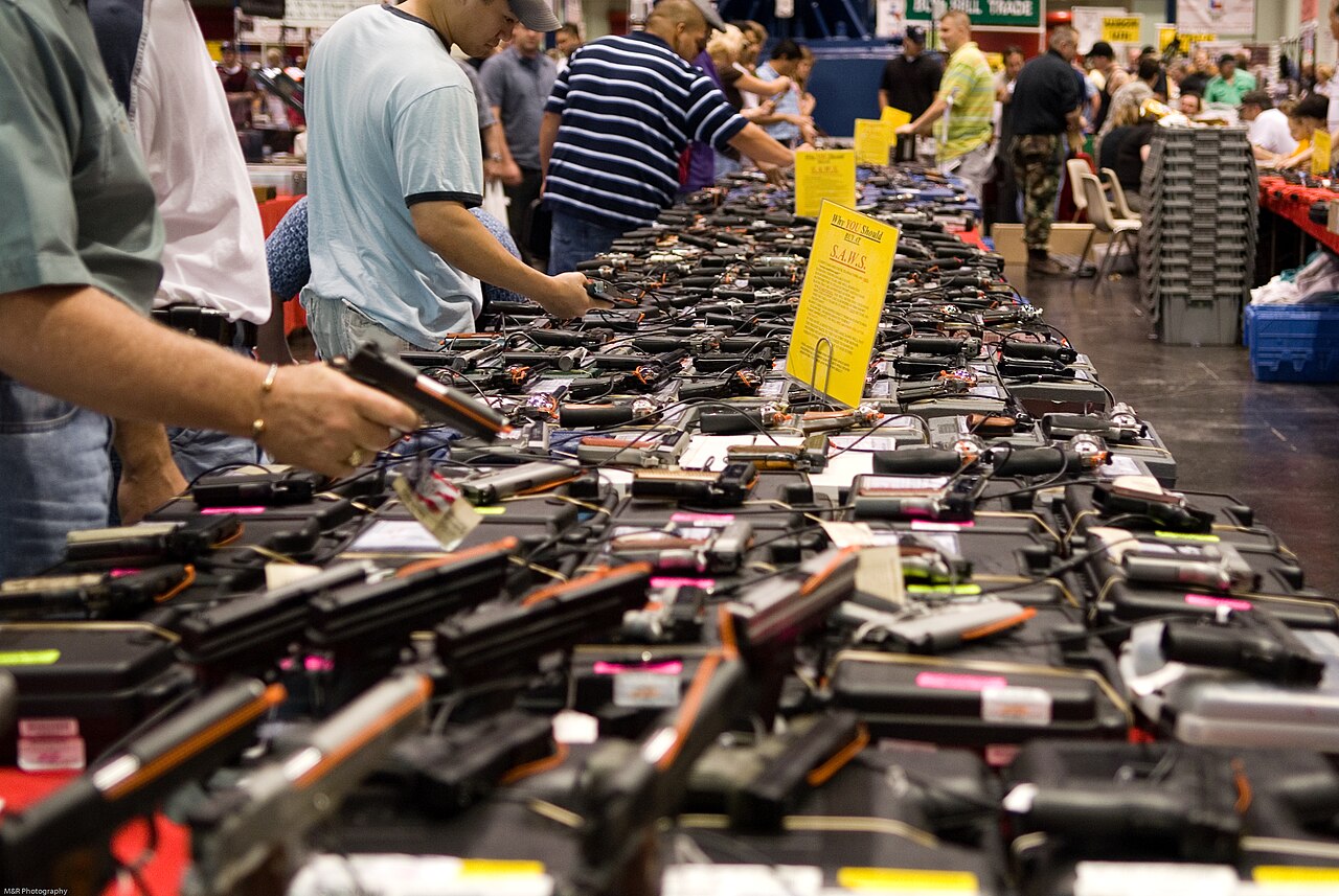 Displays and visitors at a gun show in Houston’s George R. Brown Convention Center.